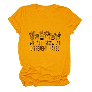Detail of cotton crew neck tee with plant illustration and inspirational text