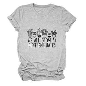 Close-up of gray cotton t-shirt with botanical print and motivational text design