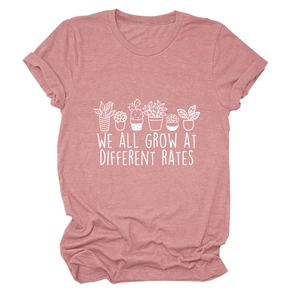 Detail of dusty pink t-shirt with potted plants print and inspirational text