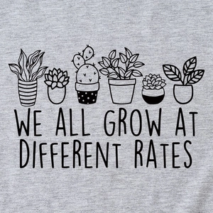 Grey crewneck cotton T-shirt featuring We All Grow At Different Rates botanical print