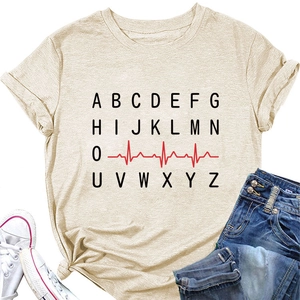 Close-up of the heart rate monitor design and alphabet print on beige cotton t-shirt