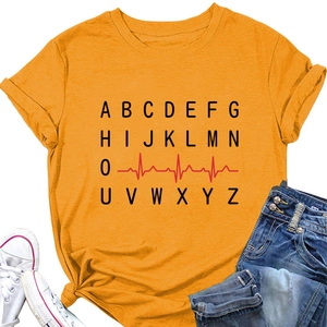 Flat lay of bright orange cotton T-shirt with heartbeat and alphabet print detail