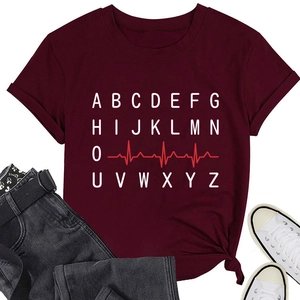 Close-up of wine red t-shirt featuring white alphabet print and red heartbeat line graphic