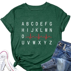 Forest green T-shirt detail showing alphabet print with red heart rate line and rolled sleeves