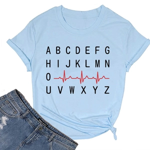 Detail of light blue t-shirt with A-Z alphabet print and red EKG line design