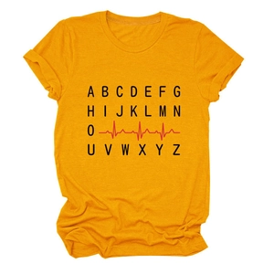 Close-up of the red EKG pulse line and black alphabet print on a ginger cotton T-shirt
