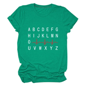 Detail of green T-shirt showing fabric texture and white letters with red heartbeat line