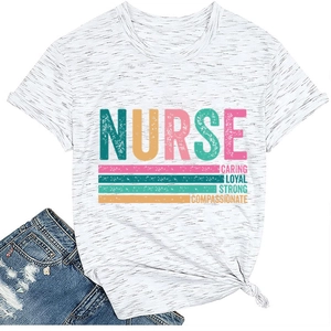 Flat lay of gray nurse t-shirt with caring loyal strong print and denim shorts