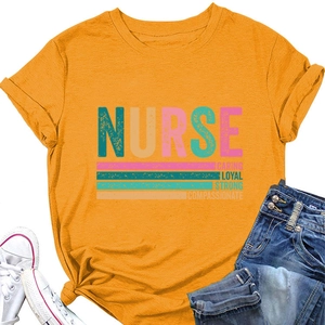 Detailed view of ginger nurse t-shirt showing Caring Loyal Strong text and cotton fabric