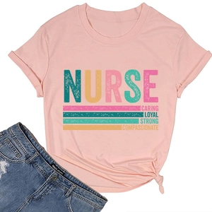 Detailed view of pink nurse T-shirt with caring loyal strong print and knotted hem detail