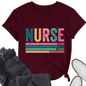 Flat lay of maroon nurse t-shirt with caring loyal strong text and fashion accessories