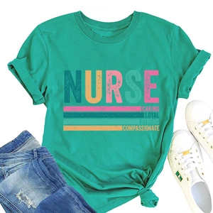 Detail of turquoise nurse t-shirt with caring loyal print, jeans and sneakers flat lay