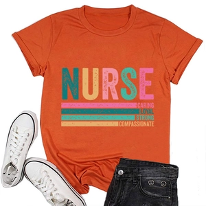 Detail view of the retro rainbow nurse print and text on the orange cotton t-shirt