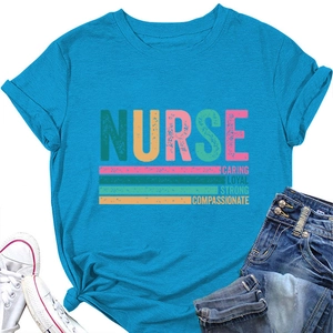 Detailed view of teal nurse t-shirt with caring loyal strong print and denim layout