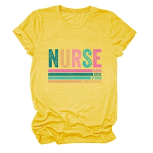 Flat lay detail of yellow Nurse T-shirt showing Caring Loyal Strong print texture