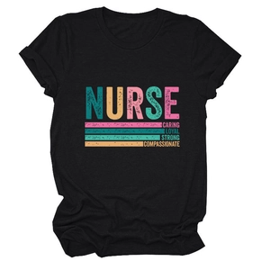 Detail of black nurse t-shirt showing colorful Caring Loyal Strong text on chest