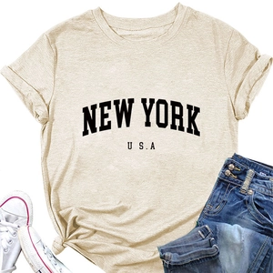 Close-up of New York USA letter print on beige cotton t-shirt with crew neck detail