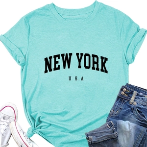 Detailed flat lay of Tiffany blue New York USA printed cotton t-shirt with jeans