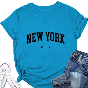 Flat lay of sky blue cotton New York USA t-shirt with classic round neck and cuffed sleeves