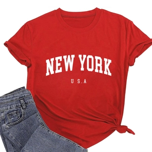 Detail of red New York USA graphic tee featuring a stylish front knot hem design