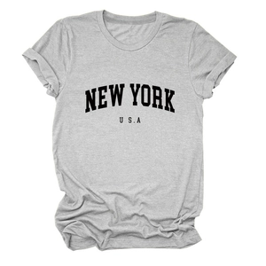Detail of rolled cuffs and black New York USA print on a light grey cotton T-shirt
