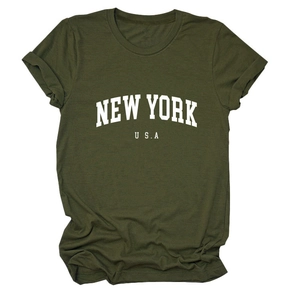 Detail of vintage New York USA white print on a dark green cotton t-shirt fabric