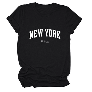 Detailed flat lay of a black cotton T-shirt featuring white New York USA typography print