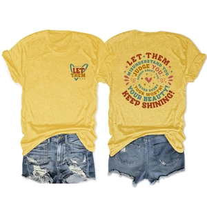 Detailed front and back view of a yellow cotton T-shirt with 'Let Them' heart graphic print