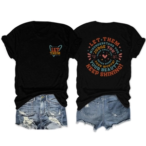 Detailed flat lay of black crew neck T-shirt with Let Them Misunderstand back print