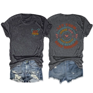 Detailed back view of charcoal grey t-shirt with inspirational quote and denim shorts