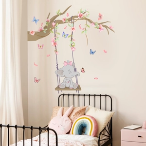 Detail of cartoon elephant on swing wall decal with pink flowers for kids room decor