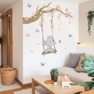 Cartoon elephant on swing wall decal with floral branch and colorful butterflies decor