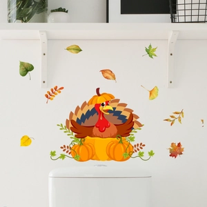 Detail of Thanksgiving turkey pumpkin wall sticker applied on a clean white bathroom wall