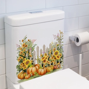 Nahaufnahme von wasserfesten Sonnenblumen- und Kürbisaufklebern auf einem Spülkasten