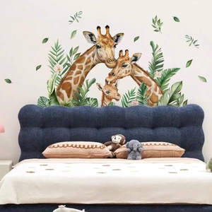 Watercolor giraffe family wall decal with tropical green leaves for kids room decoration