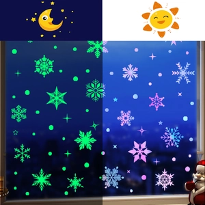 Luminous Christmas snowflake window stickers showing day and night glowing effects