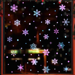 Luminous gradient snowflake and star window stickers on glass for winter holiday decor