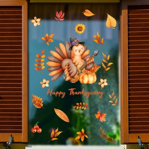 Detail of cartoon turkey window sticker with Happy Thanksgiving text on glass
