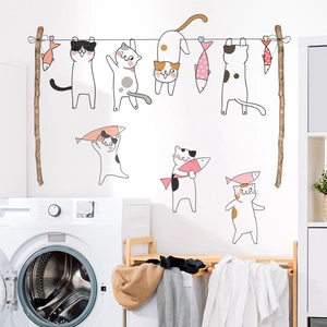 Cartoon cats hanging on laundry line wall decals for nursery and bedroom decor