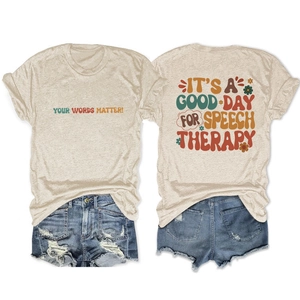 Detail of retro speech therapy print on beige t-shirt and distressed denim shorts
