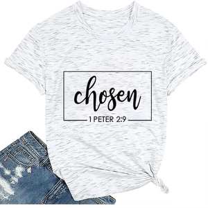 Flat lay of a white heathered T-shirt with black chosen print and denim shorts