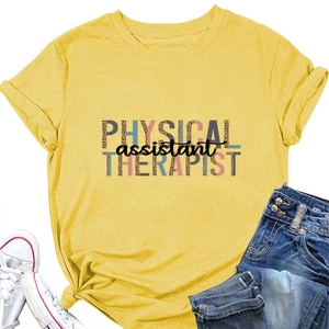 Flat lay of yellow physical assistant therapist t-shirt with leopard print text and denim