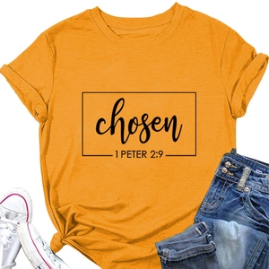 Detail of mustard yellow t-shirt with chosen 1 peter 2:9 print and cuffed sleeves