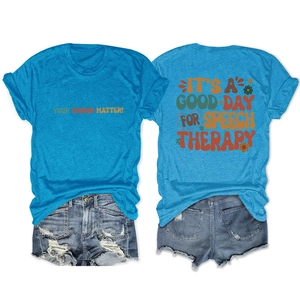 Flat lay of blue cotton t-shirt with back speech therapy print and denim shorts