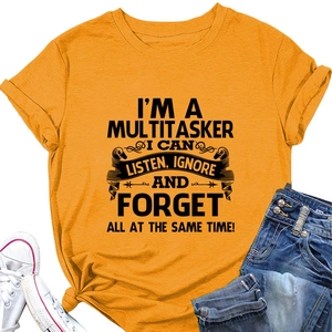 Detail of funny quote print on ginger cotton t-shirt with knotted hem and round neck