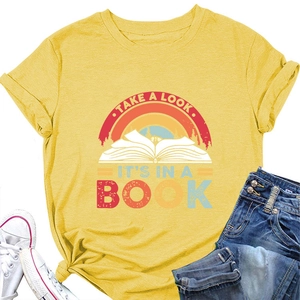 Flat lay of yellow cotton T-shirt featuring a rainbow book print and casual styling