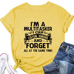 Detail of yellow cotton T-shirt featuring multitasker slogan print and side knot design