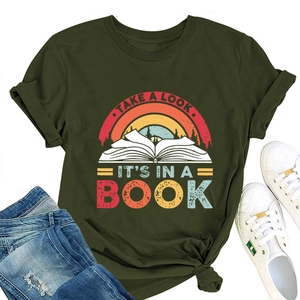 Close-up of vintage book and rainbow print on a dark green cotton women's T-shirt