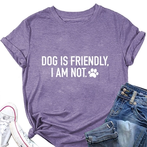 Detail of purple cotton T-shirt featuring slogan print and stylish front hem knot design