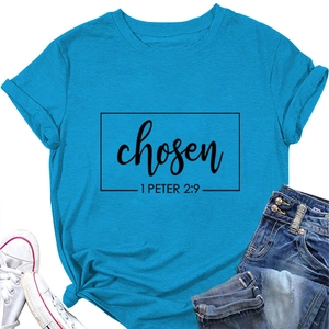 Flat lay of sky blue 1 Peter 2:9 crewneck t-shirt with chosen typography print